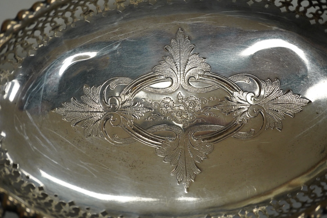 A pair of Edwardian repousse silver pedestal bowls, by Charles Boyton & Son Ltd, London, 1906, diameter 11.4cm(a.f.), 6.9oz and a plated two handled dish.